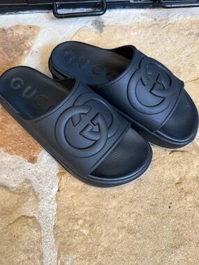Gucci Woman’s Black Embossed GG Slide Sandals